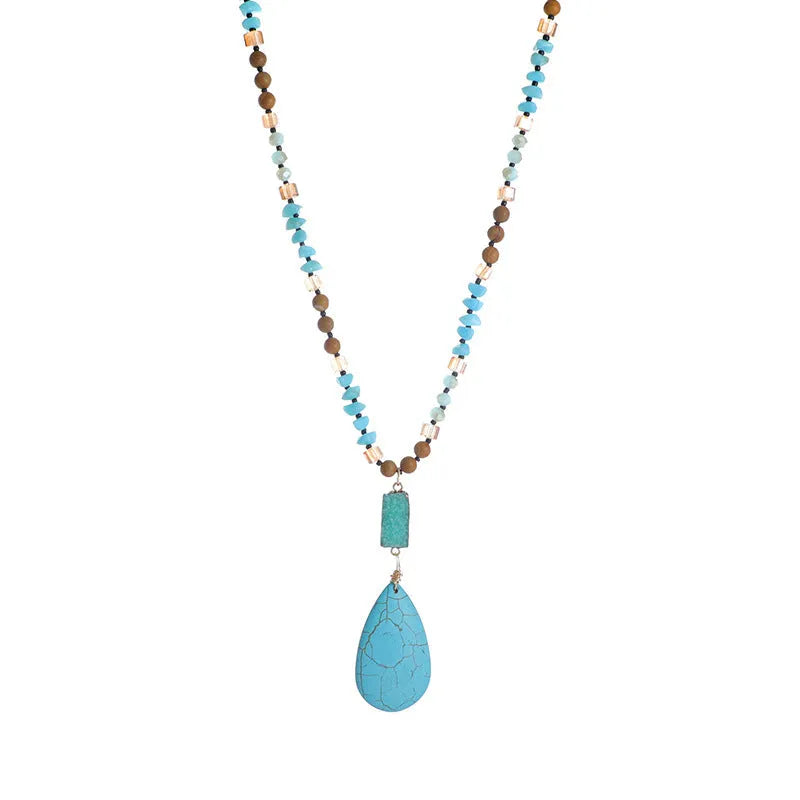 Turquoise blue geometric pendant necklace with ball bead chain measuring 81cm length