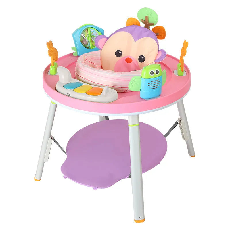 Baby in three-in-one jumper seat with duck design, bouncing with interactive toys