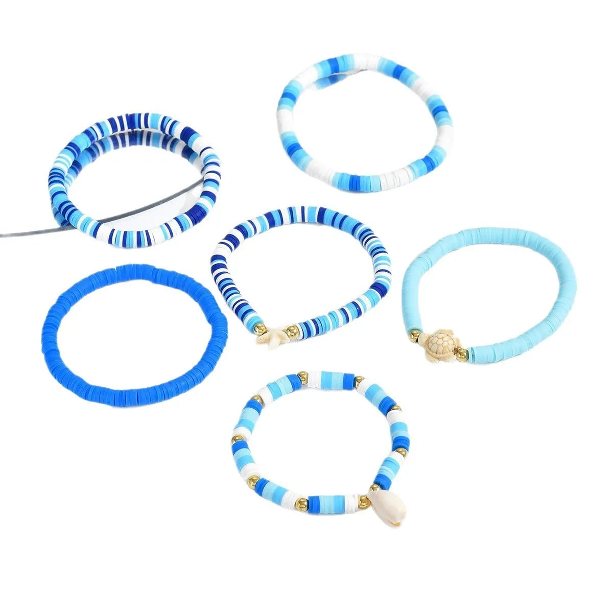 Bohemian blue polymer clay handmade shell bracelet suit set of 6 unisex bracelets on display