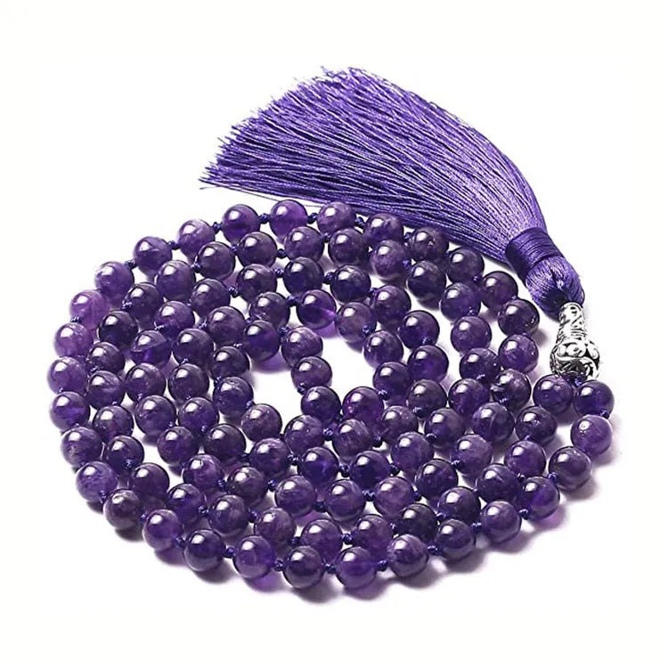 Long agate and amethyst tassel necklace with geometric beads in multiple colours on a 95-100cm chain.