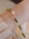 Natural olivine double layer bracelet with Twin Bells of Ireland charms and olive branch decoration