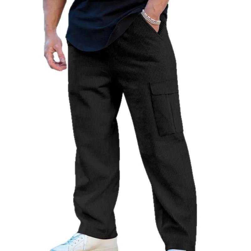 Men's loose-fitting corduroy cargo trousers in navy blue with a drawstring waist and wide straight legs