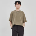 Men's loose casual drape knit T-shirt in solid colour, short sleeve, polyester blend, available in black brown white sizes S to 2XL