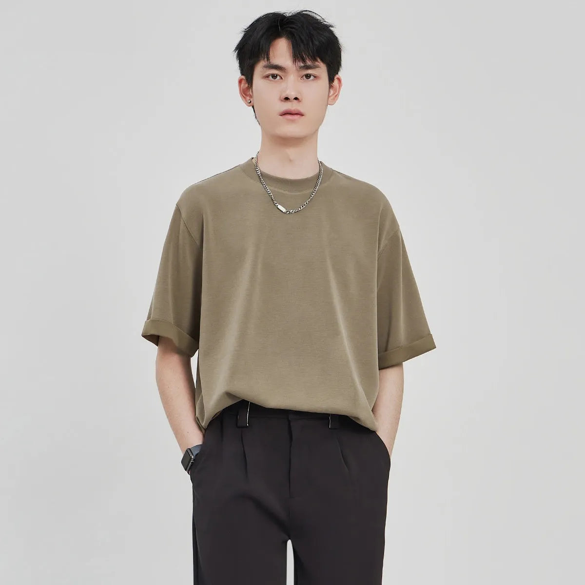 Men's loose casual drape knit T-shirt in solid colour, short sleeve, polyester blend, available in black brown white sizes S to 2XL