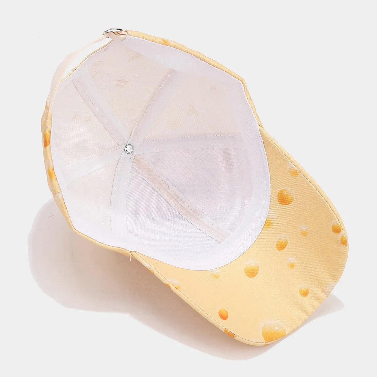 Full printed cheese pattern peaked cap with adjustable strap and dome crown