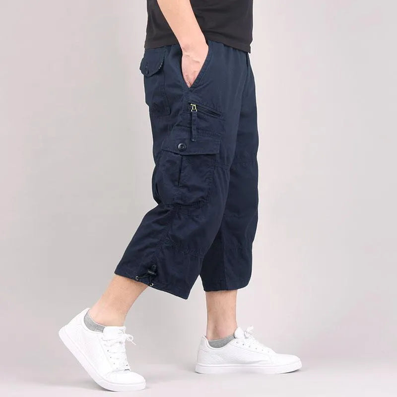 Men's cotton cropped casual pants in solid colours with cargo styling for sports wear