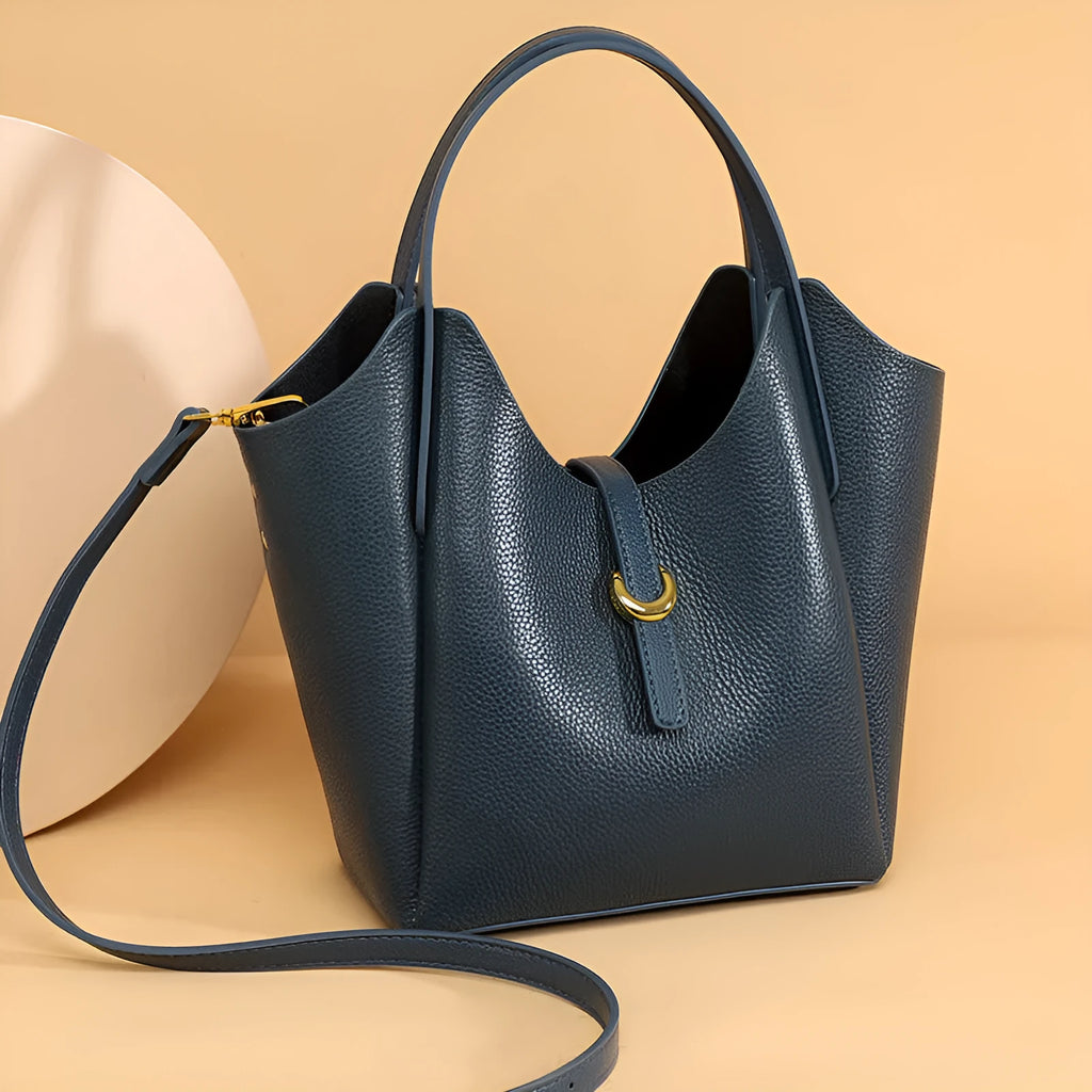 Genuine leather women's bucket handbag in European American retro style with hand holding design