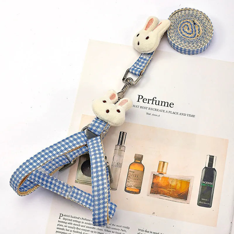 Blue quick release nylon dog harness and matching leash for small pets.