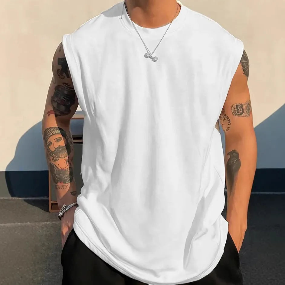 Men's loose solid colour cotton sleeveless tank top on a hanger