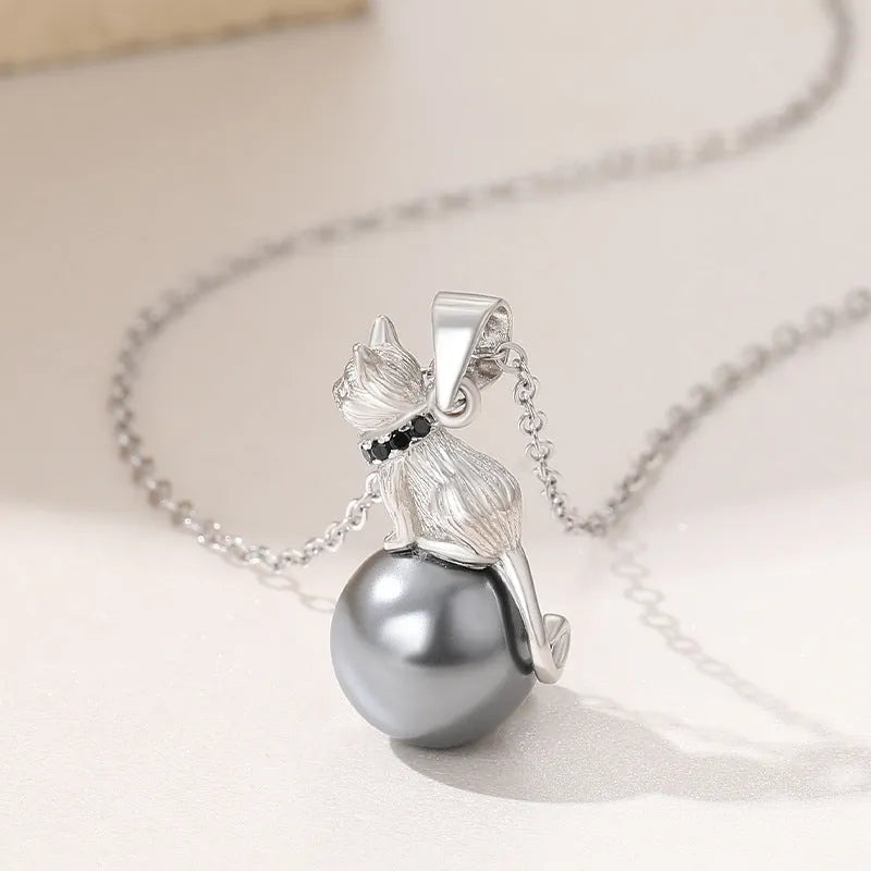 Sterling silver cat pendant necklace with feline design, available with or without chain