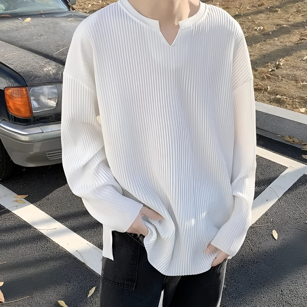 Plus size women's striped texture draping solid colour pullover top in black, loose fit, long sleeves, polyester knit