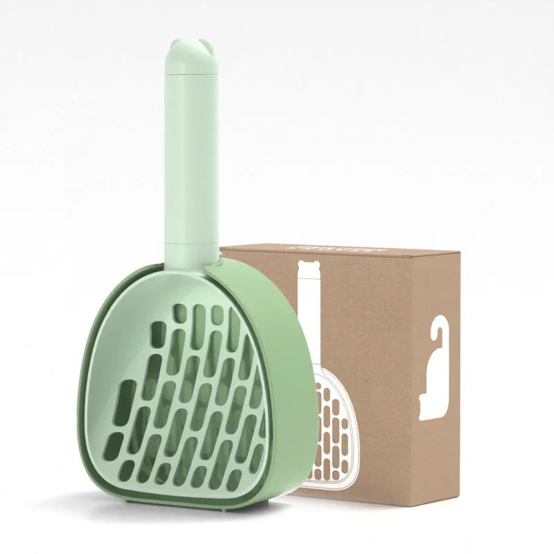 Plastic cat litter scoop with base in white model, showing hidden bag storage compartment and large scoop head with alternating apertures