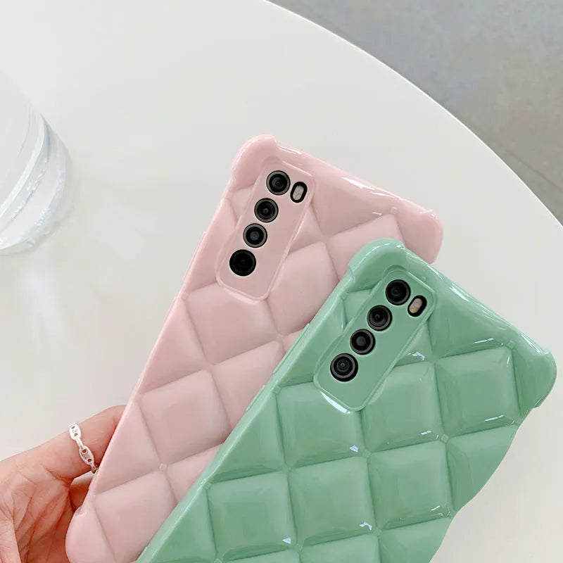 Black silicone diamond pattern phone case for a Huawei smartphone on a white background.