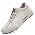 Men's white and black matte leather casual shoes with round toe and flat heel.