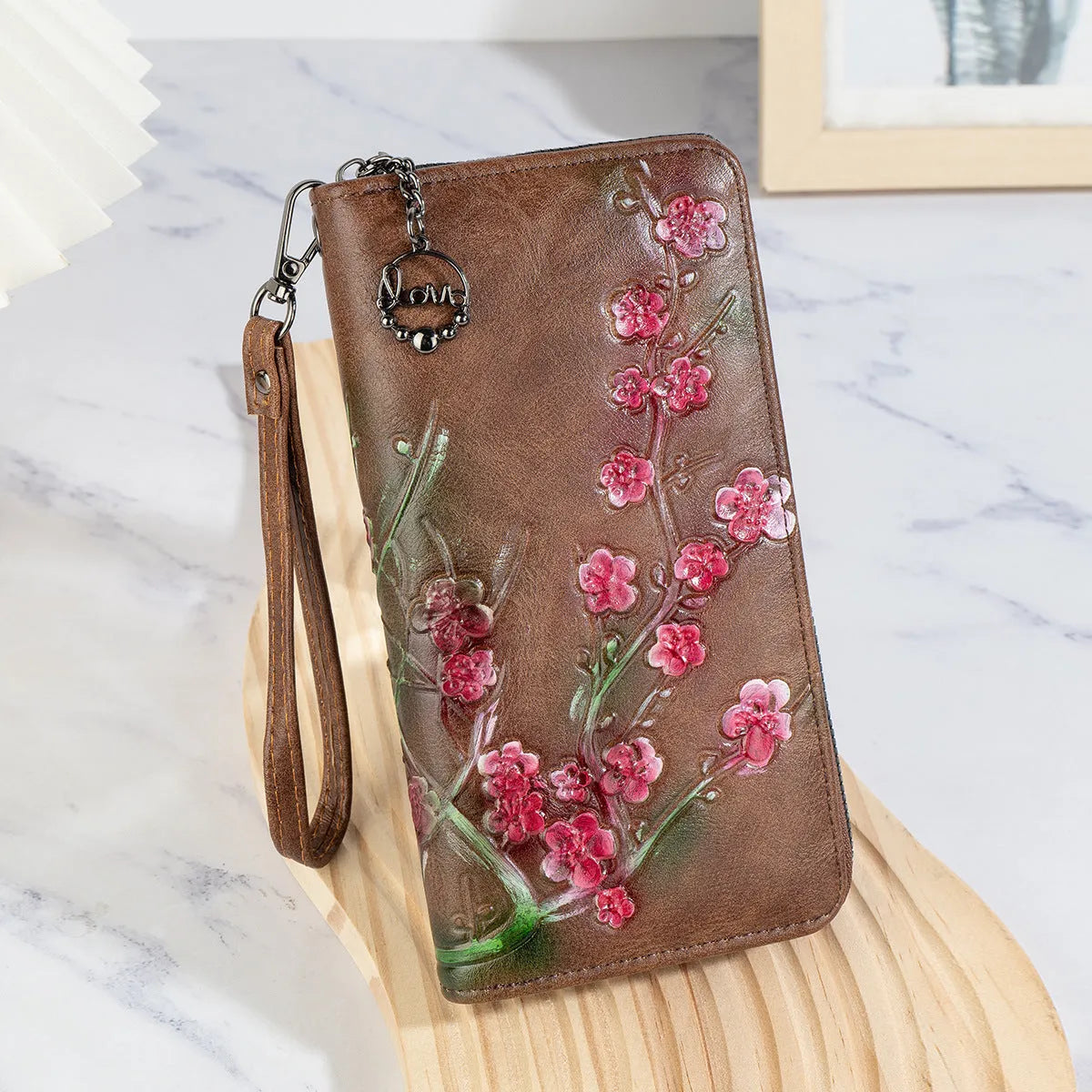 Chinese style floral embossed PU leather zipper handbag in black, brown, and coffee colours.