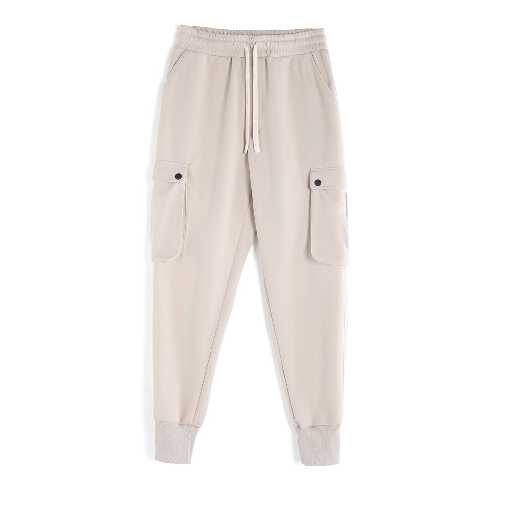 Men's loose cotton trousers with multiple pockets and adjustable ankle ties in solid colour options