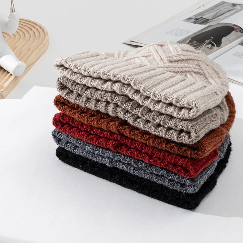 Women's wool knitted dome winter hat in ankela red colour showing thickened knitting texture