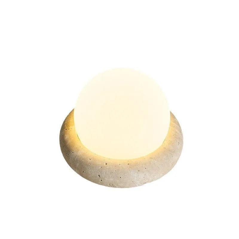 Cream modern bedside night lamp with remote control on wooden nightstand