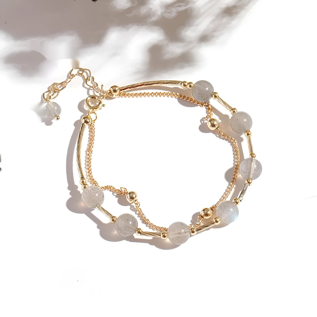 Crystal bracelet with double-layer copper tube and moonstone finish on white background