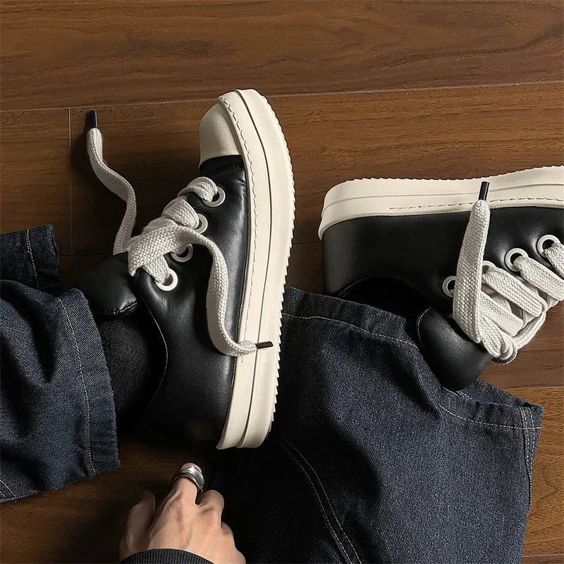 Men's black leather low-top slip-on casual shoes with raised bottom board, round toe, and front lace-up