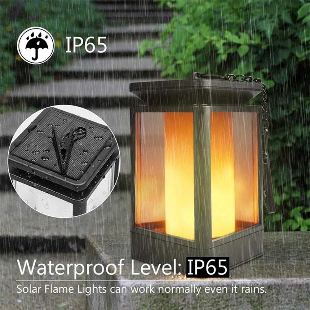 Black antique flame style outdoor solar LED street lamp with solar panel on top.