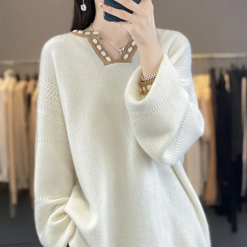 Women's camel colour v-neck viscose sweater with regular long sleeves on hanger