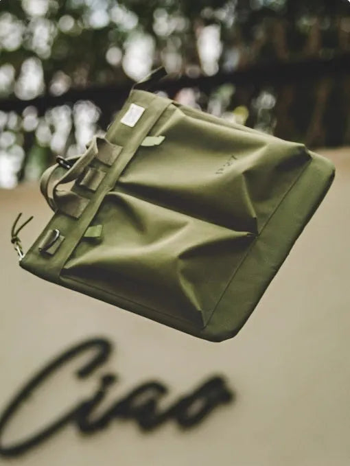 Marden Tooling retro canvas crossbody shoulder bag in military green or charcoal black showing internal phone compartment