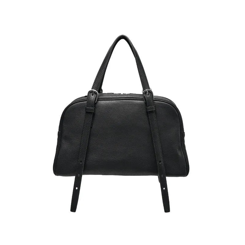 Women's genuine leather retro shoulder bag in horizontal square shape with double strap.