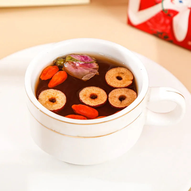 Box of Brown Sugar Ginger Tea 150g with red dates, wolfberries, and ginger tea bags