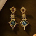 Gold geometric retro stud earrings with diamond finish on alloy material