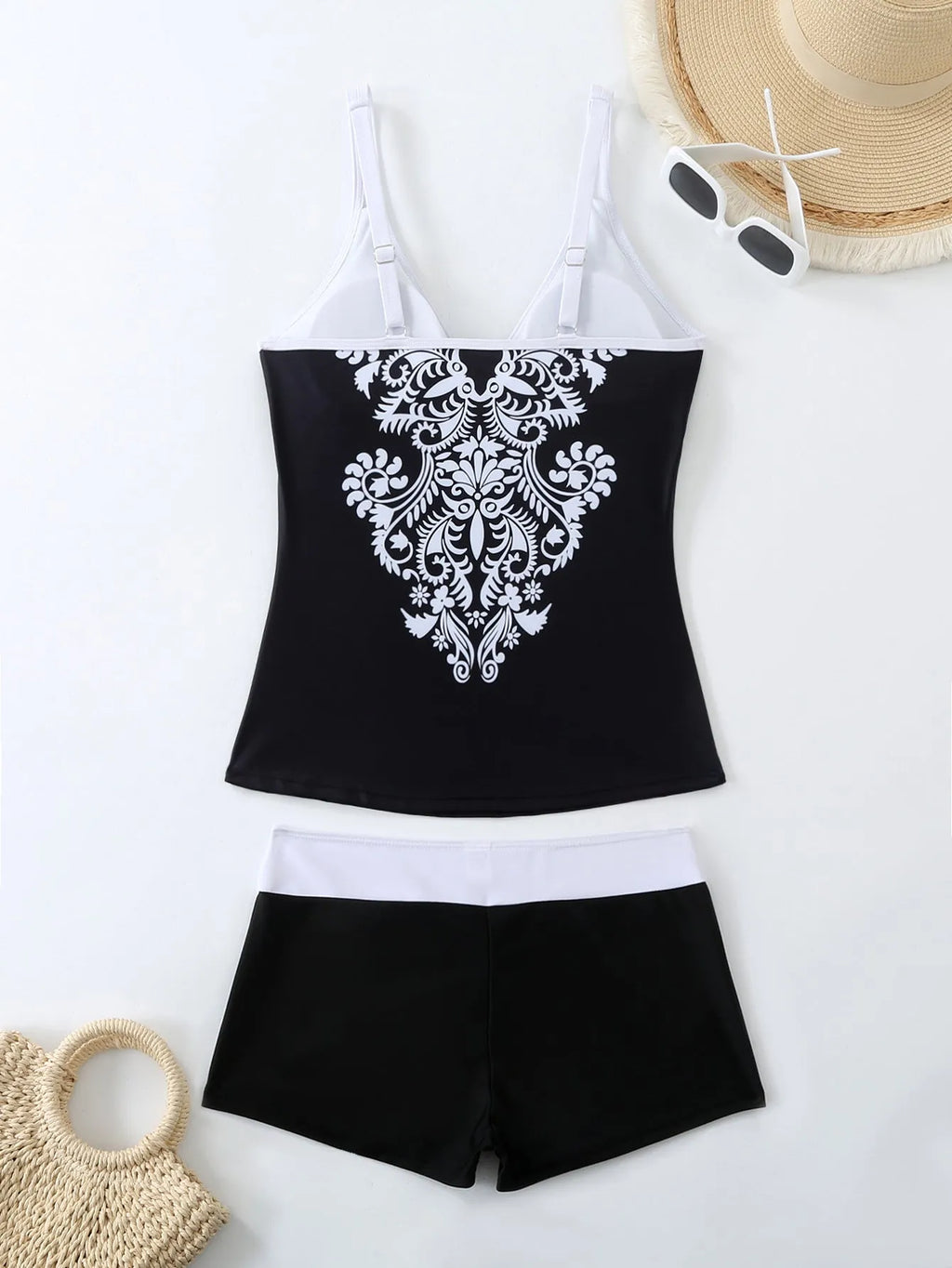 Plus size black and rose red two-piece swimsuit set with briefs and swimming trunks.