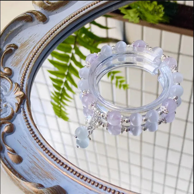 Cute handcrafted crystal bracelet in opal amethyst colour with moon-shaped pendant over 20mm size