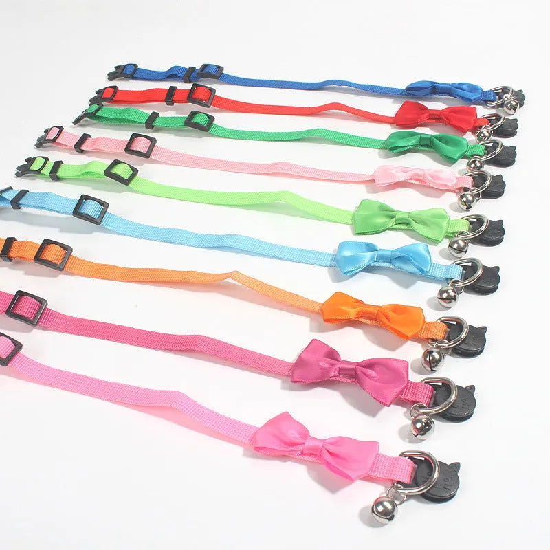 Adjustable nylon cat collar with bell decoration in multi-colour striped design