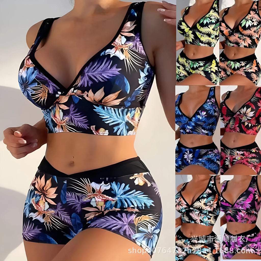 Women's two-piece swimsuit set with printed boxer briefs and sleeveless top in a multi-colour pattern.