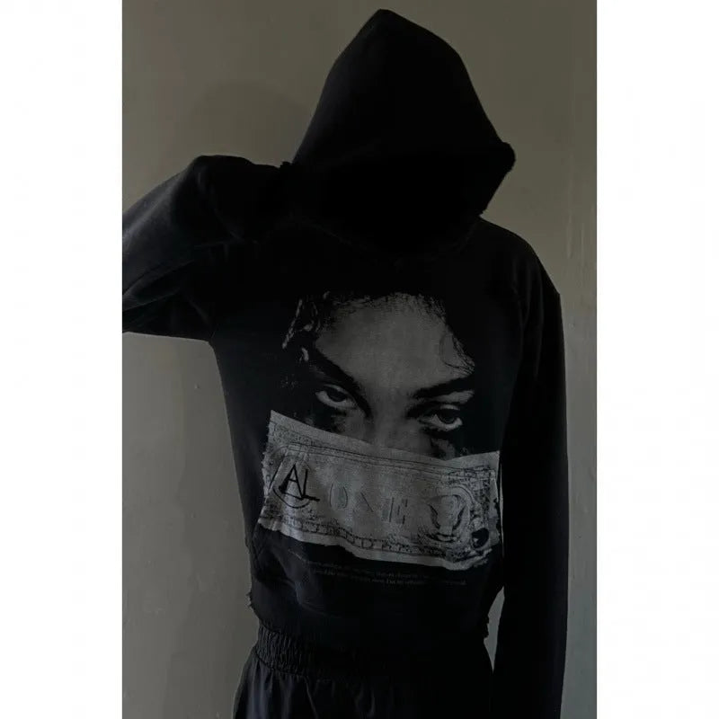Women's loose fit black polyester hoodie with dark printed cartoon pattern front view