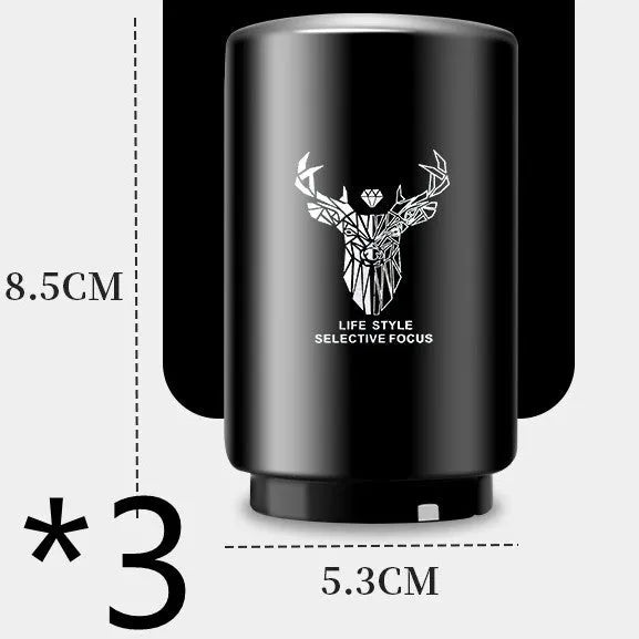 Automatic stainless steel beer bottle opener with magnetic cap catch on a table
