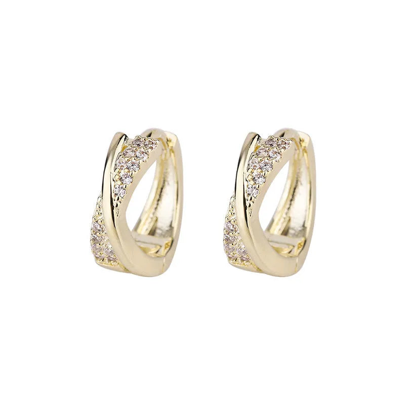 Geometric women's earrings with 14K yellow gold finish and zircon stone details on copper base