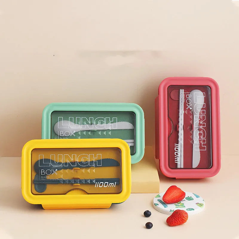 Green four-layer partitioned plastic bento box showing compartment separation