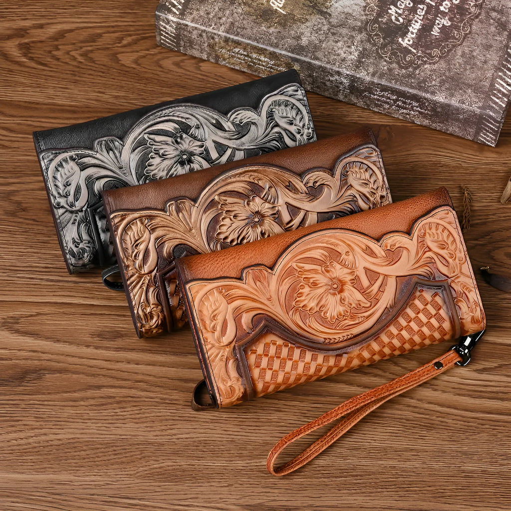 Chinese style embossed leather wallet in tri-fold design showing floral pattern on brown cowhide