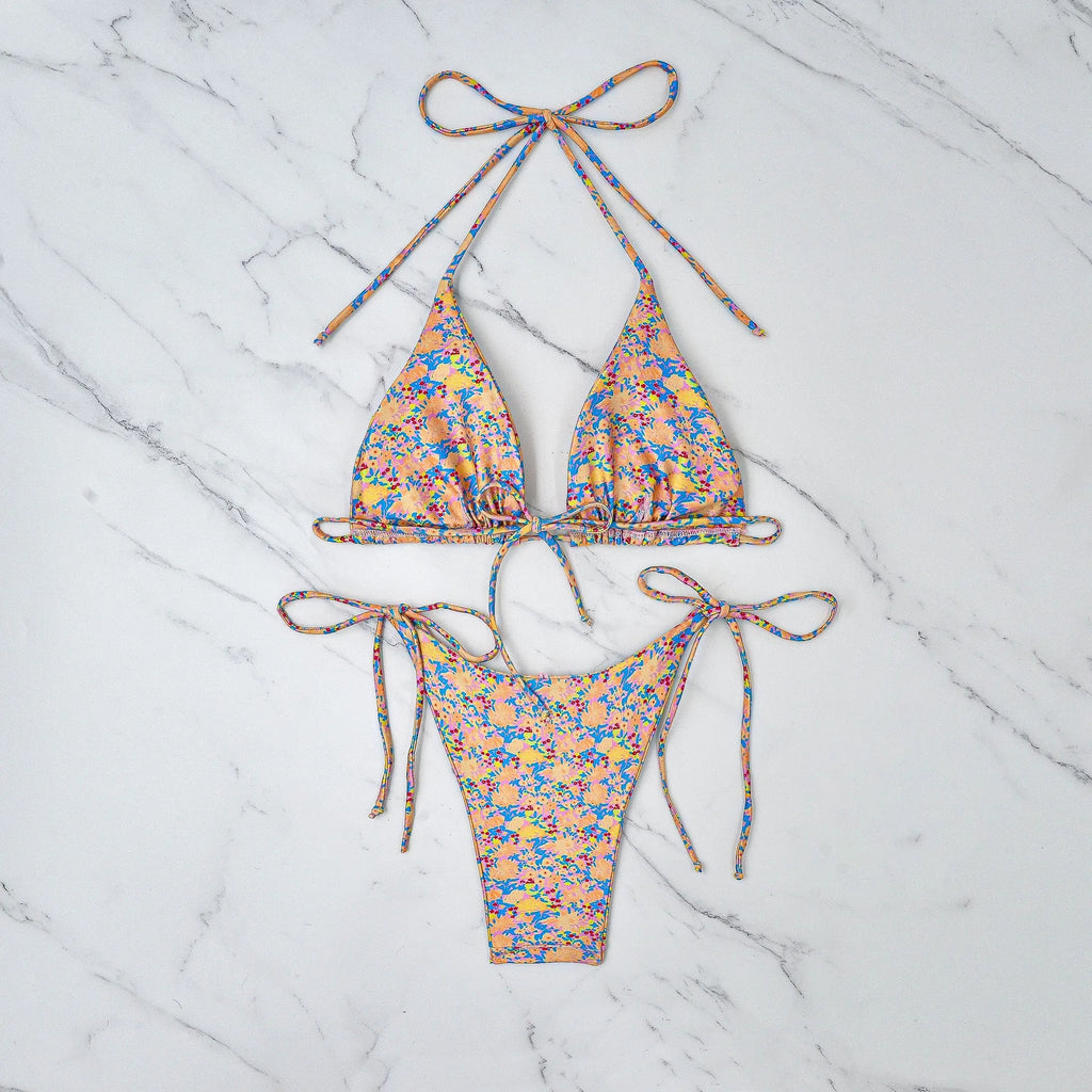 A pictured colour lace-up bikini swimsuit with adjustable ties and a backless briefs design.