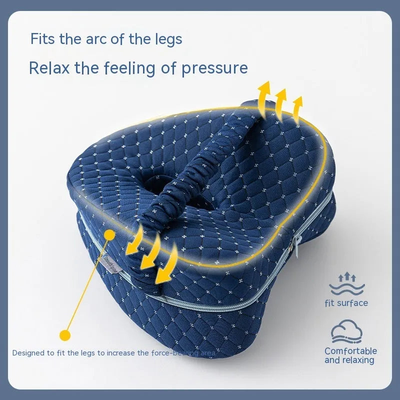 Dark blue jacquard heart-shaped memory foam leg pillow showing dimensions 25x23x13cm