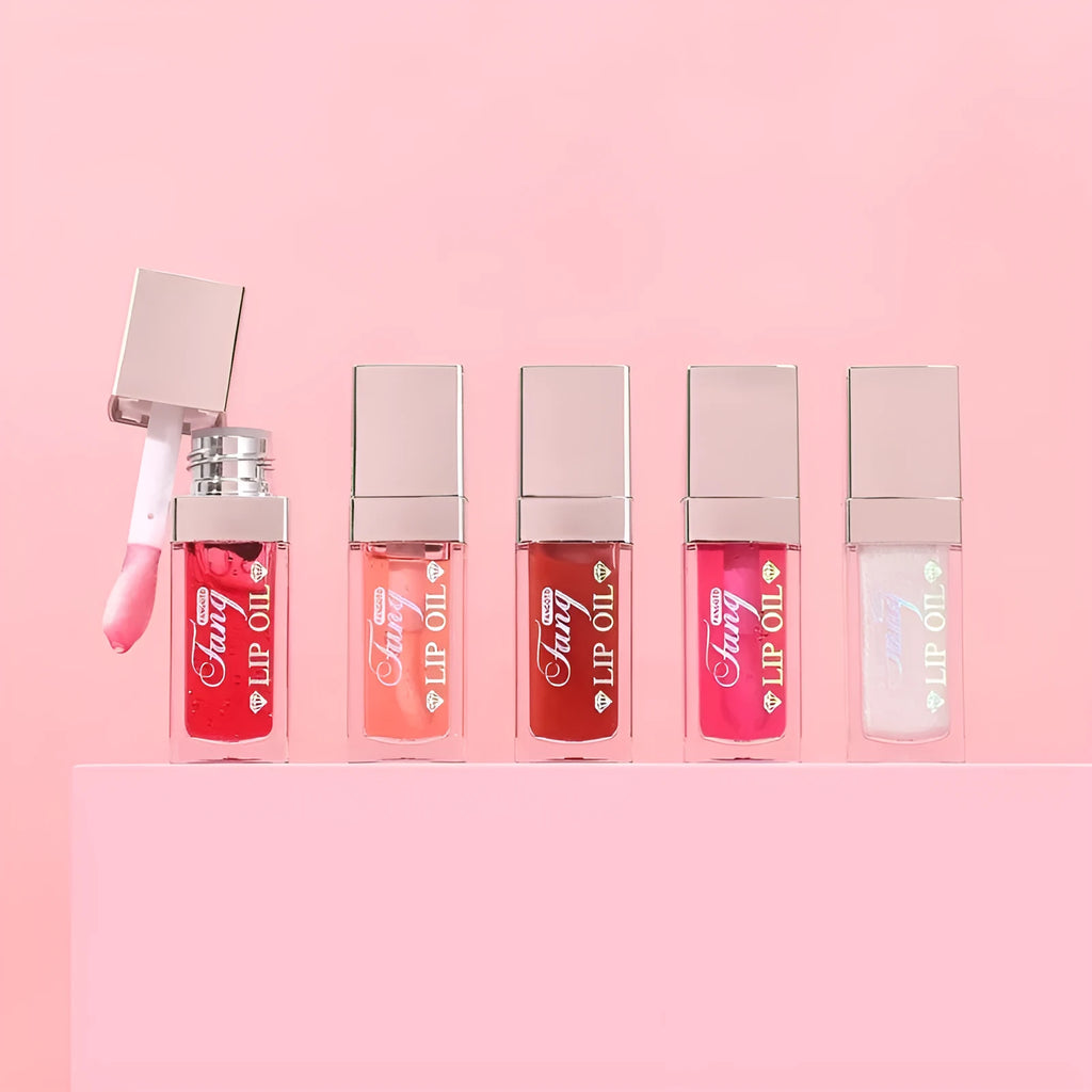 Five tubes of bright mint lip gloss lipstick in different shades on a white background.