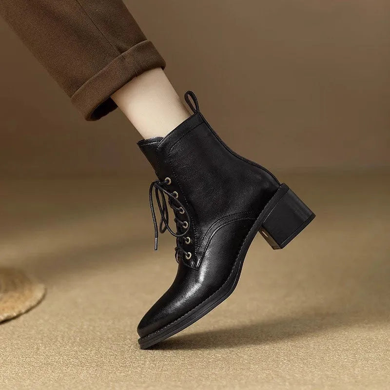 Women's black pointed toe ankle boots with short tube design and block heel