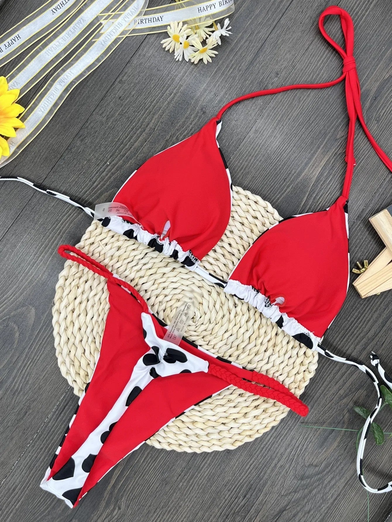 Backless one-piece swimsuit with a heart print and split side detail