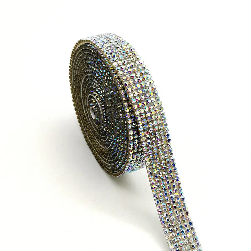 Long strip of self-adhesive electroplated glass water drill stones for clothing decoration.