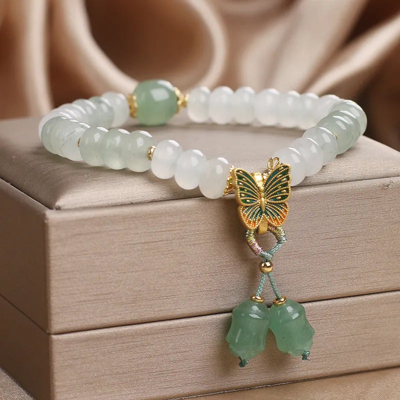 Green crystal Tian Shan Cui abacus beads jade bracelet with retro butterfly tassel and pearl decoration