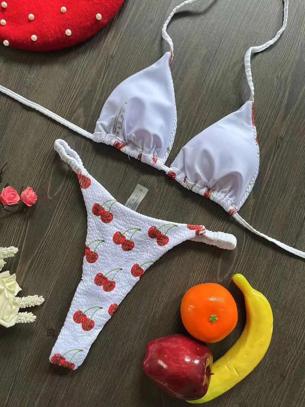 Women's printed bikini swimsuit set with quick-dry fabric on a mannequin, showing briefs style.