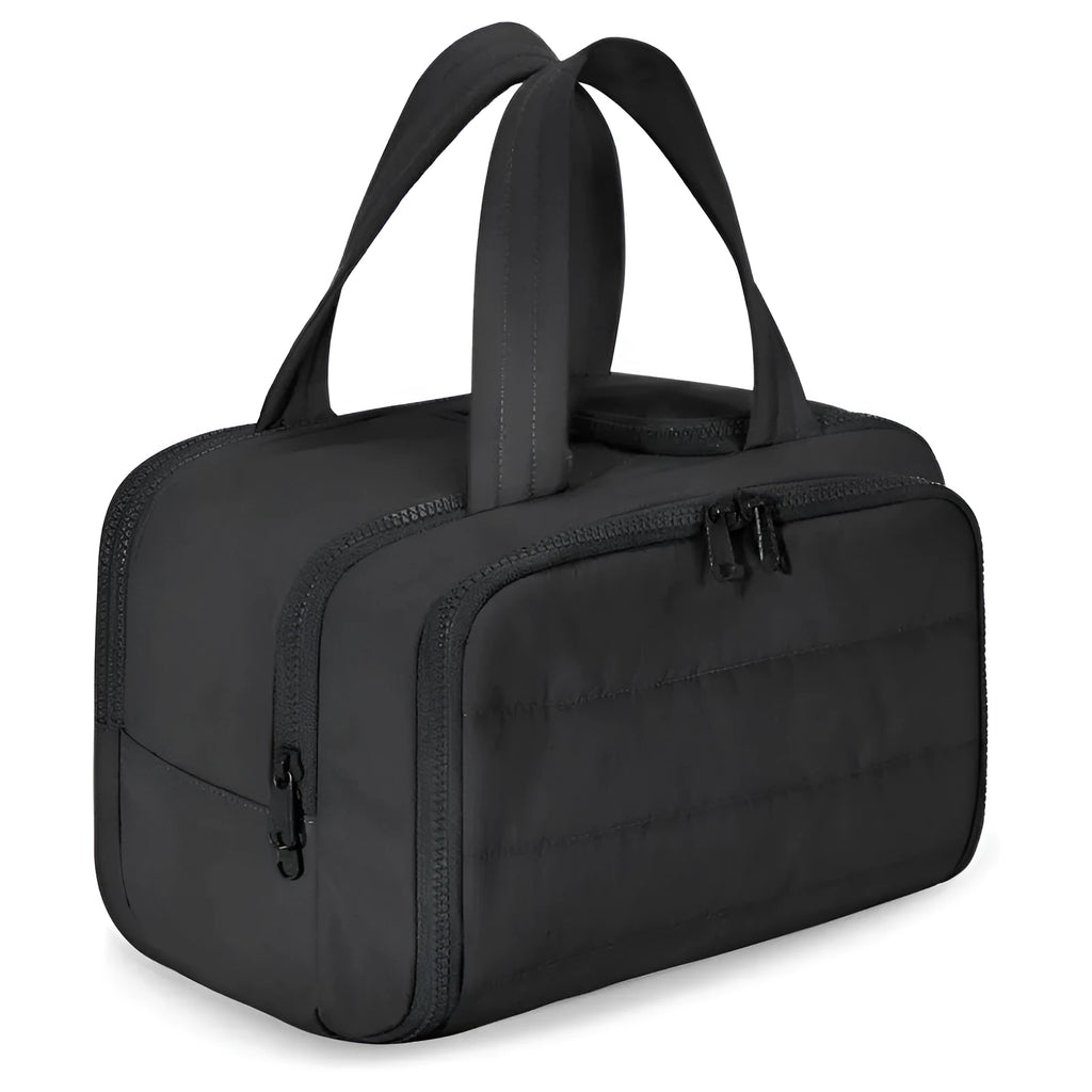 Large lightweight polyester travel toiletry bag with wide opening in beige colour on a neutral background.