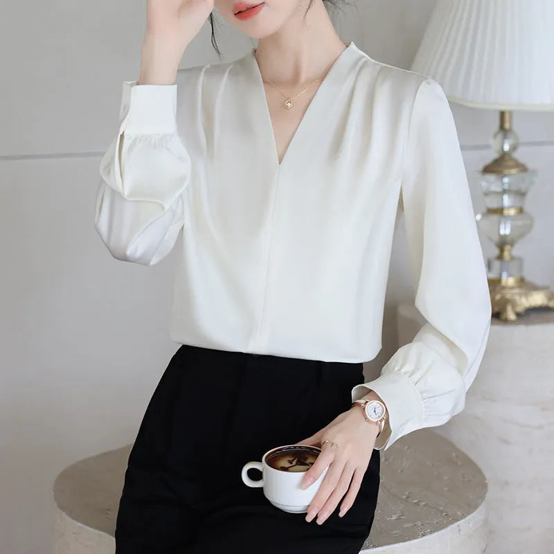 Solid colour women's long sleeve satin shirt with 3D stitching in blue and apricot