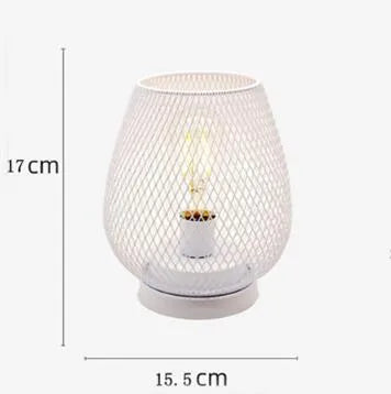 Retro iron art battery-powered table lamp with hollowed-out birdcage design in white finish